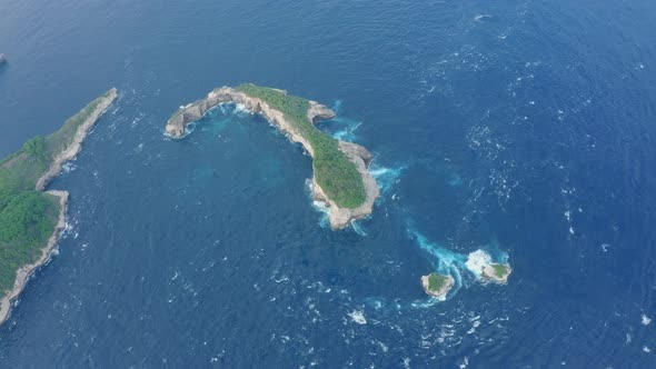 Aerial View of Beautiful Islands of Atuh Beach with Wild Vegetation