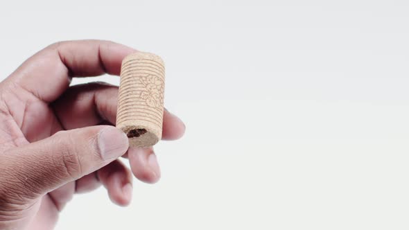 Hand Holds Wine Bottle Cork