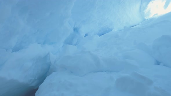 Ice, Snow Covered Cave of Antarctica. Polar Shot.