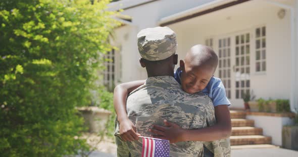 Father and son hugging each other