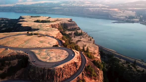 Stunning viewpoint at the top of a cliff with a road, amazing aerial landscape scene in Georgia