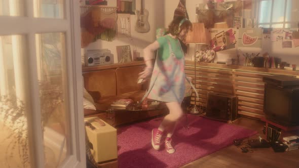 Girl with Tape Player Dancing in Room