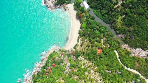 National reserve, Haad Than Sadet Beach with white sand colorful houses palms and crystal clear turq