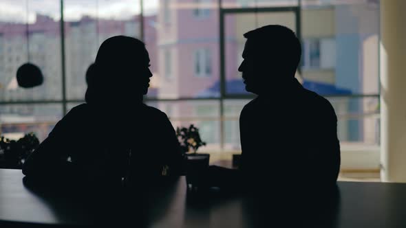 Silhouettes of Man and Woman