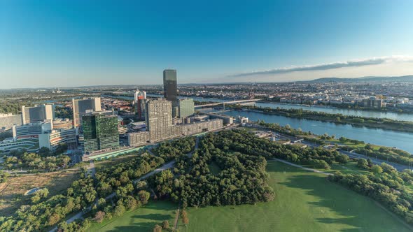 Aerial Panoramic View of Vienna City with Skyscrapers Historic Buildings and a Riverside Promenade