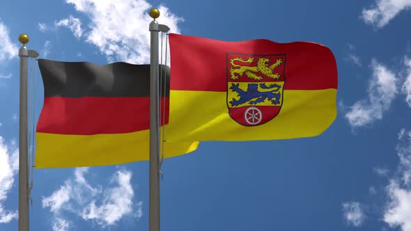 Germany Flag Vs Göttingen Landkreis Flag on Flagpole