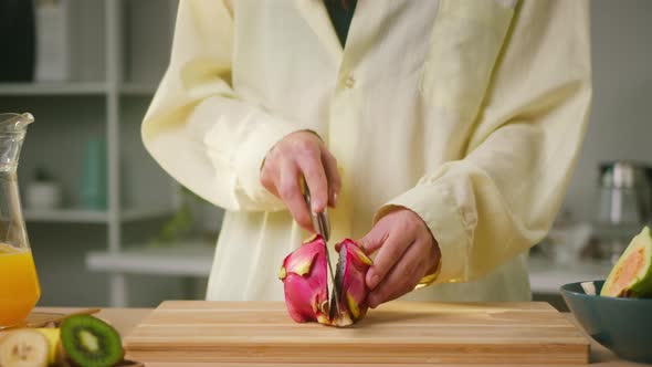 Woman Cutting Pitahaya Closeup Halves of Dragon Fruit Preparing Ingredients for Cooking Smoothie