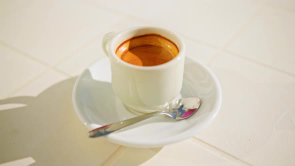 Strong Espresso Served in a White Tableware