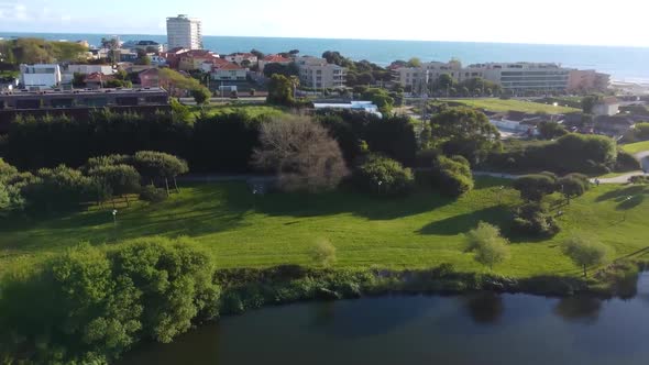 Drone video over natural park in Portugal Matosinhos, city park, nature and city