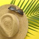 Straw Hat Green Palm Leaf and Sunglasses on Yellow Backdrop - VideoHive Item for Sale