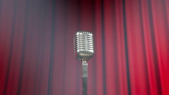 A vintage microphone on the stage. Old classic mic in the theatre. Show.Closeup