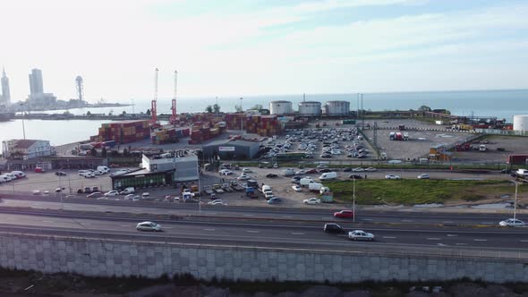 Aerial top view of cargo ship standing in the port