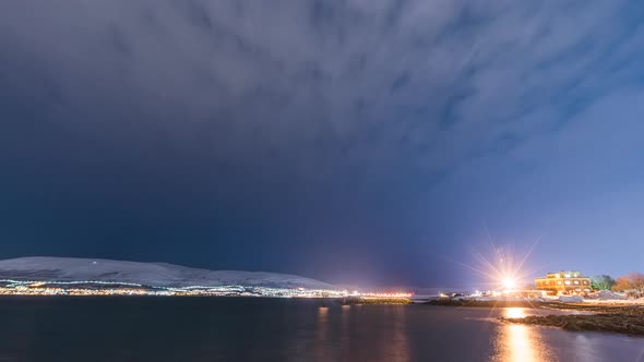 Time lapse of Tromso Airport at night, airplanes leaving; Tromso, Norway