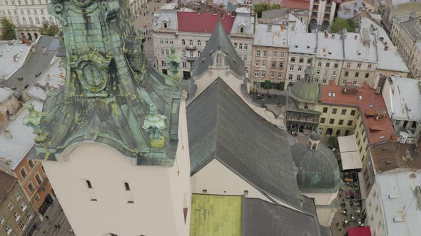 Aerial Drone Video Panorama of Latin Cathedral in City Lviv Ukraine Flight Above Roofs Streets
