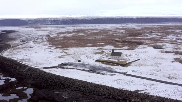 Secluded Church in Snowy Iceland on the Coast