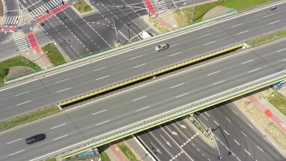 Top view over the highway, expressway and motorway, Aerial view interchange with car driving down th