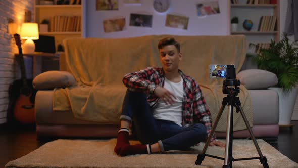 Teenage Blogger Recording New Video on Smartphone for His Followers, Hobby
