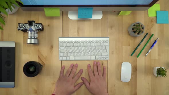 Flat Lay Of Man Hands Working On Computer