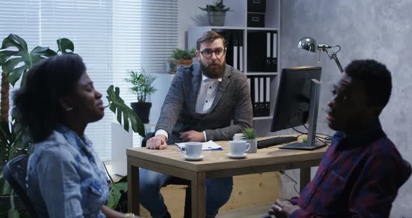 Young Couple Arguing in the Office of a Psychologist