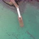 Pontoon filmed from above on a coastal scenary - VideoHive Item for Sale