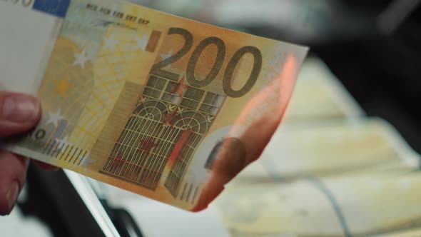 Burning Two Hundred Euro Banknotes Flame of Fire From Money