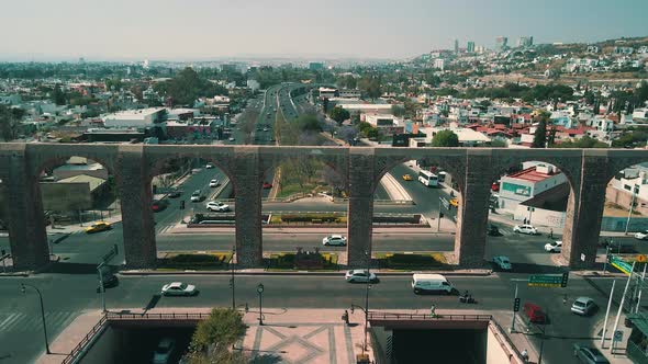 View of on arch in queretaro and the nearest avenues