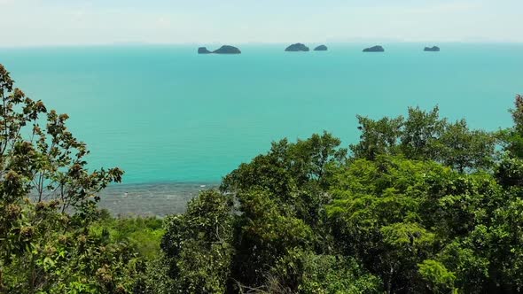 Five Sisters Islands in Serene Water Surface. Enchanting Landscape, Greenery and Deep Calm Water