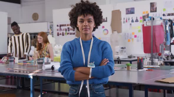 Mixed race woman working in creative office