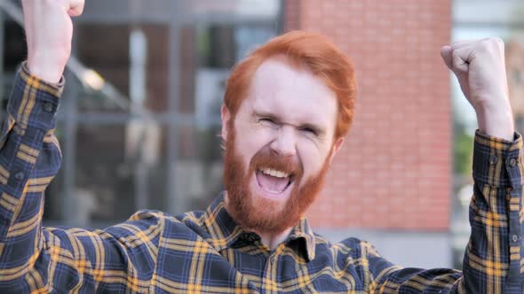 Redhead Beard Young Man Celebrating Success Outdoor
