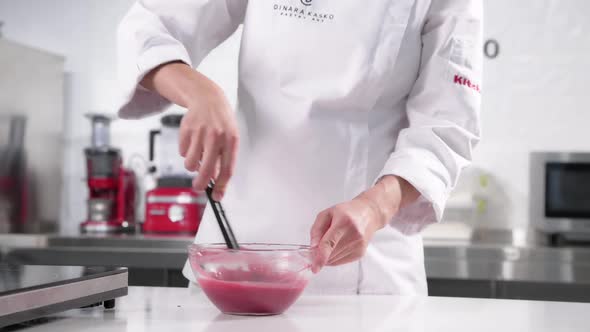 Pastry Chef Whips Mousse for a Signature Cake