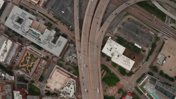 Aerial Birds Eye Overhead Top Down Panning View of Busy Multilane Highway Interchange