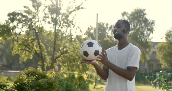Amateur Football Player Performs Tricks with the Soccer Ball