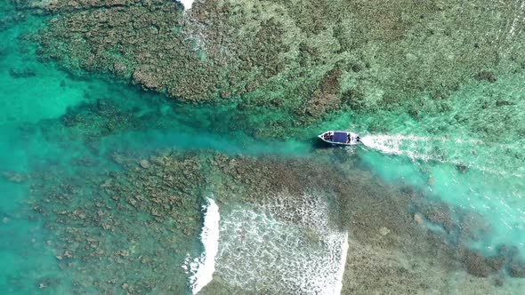 View of boat at coral reefs, Flic-en-Flac, Mauritius