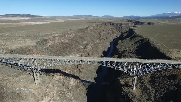 Drone video of the Rio Grande Gorge Suspension Bridge Colorado New Mexico Taos Snow