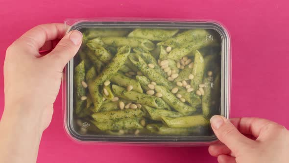 Pasta with Pesto Sauce and Pine Nuts Closeup