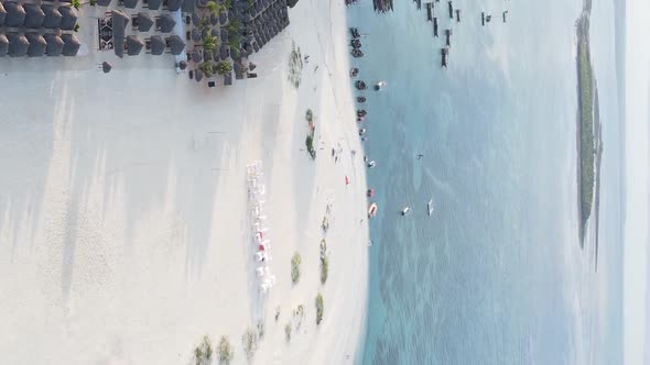 Vertical Video Boats in the Ocean Near the Coast of Zanzibar Tanzania Aerial View