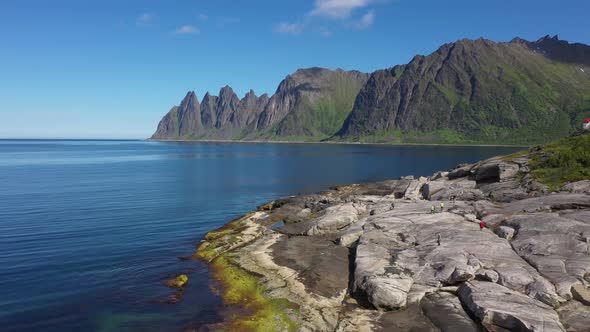 View on popular travel destination and Rock Davil’s Jaw in the sunny summer day, Norway,island Senja