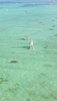 Boat Boats in the Ocean Near the Coast of Zanzibar Tanzania Slow Motion Vertical Video