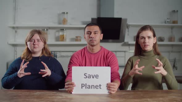 Deaf People Showing Save Planet on Sign Language