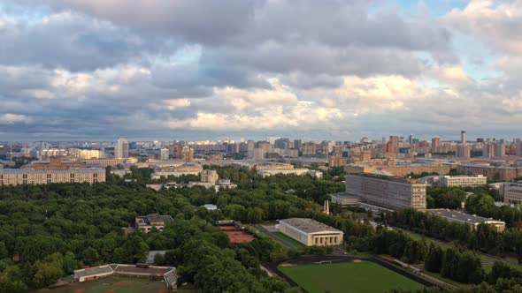 Aerial Drone Zoom in of Moscow Suburban Panorama Under Cloudy Sky