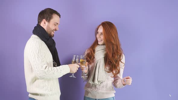 Handsome Man Celebrating New Year's Day with Charming Woman