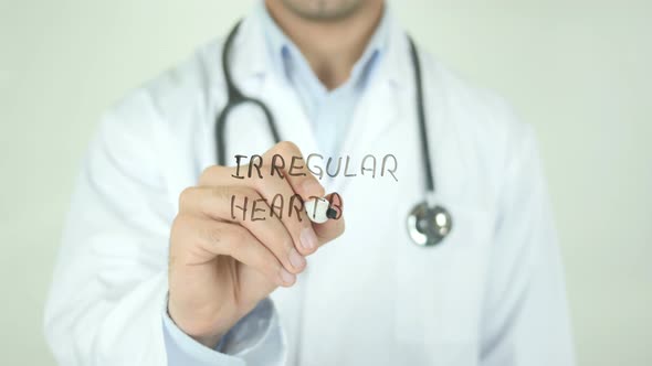 Irregular Heartbeat, Doctor Writing on Transparent Screen