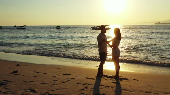 Beautiful Boy and Girl in Love Dating on Vacation Live the Dream on Beach on Summer White Sandy 