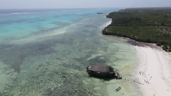 Aerial View of a House on Stilts in the Ocean on the Coast of Zanzibar Tanzania Slow Motion