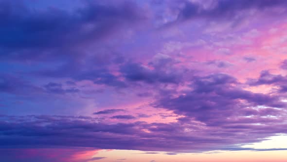 Sunset pink clouds over the sky. Nice skyscape with summer colors. Travel vacation holiday mood. Sce