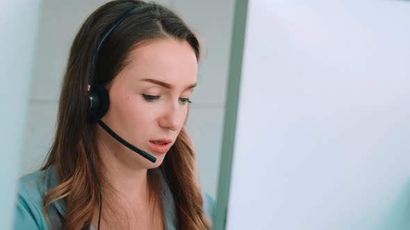 Business People Wearing Headset Working in Office