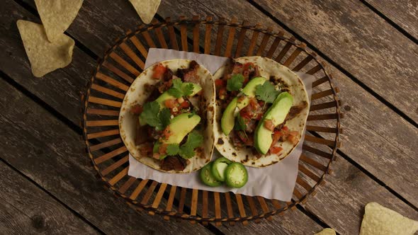 Rotating Shot of Delicious Tacos on A Wooden Surface