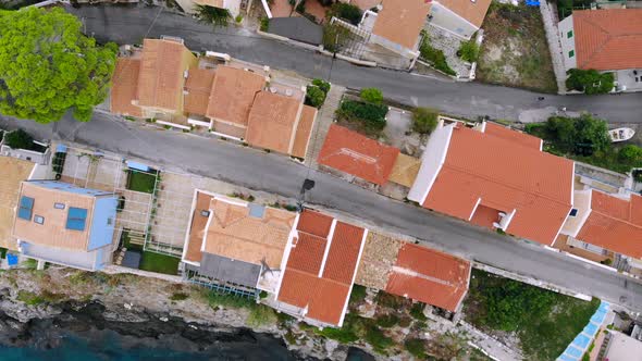 Top Down Aerial View, Flight Over the Rooftops of a Mediterranean Tourist Town