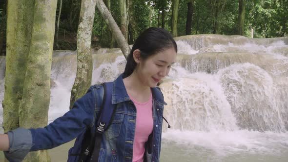 Hiker Woman Hiking At Waterfall