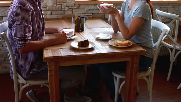 Couple having coffee in cafe